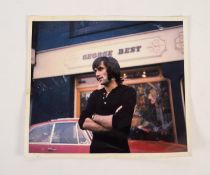 GEORGE BEST MANCHESTER UNITED. An original colour press photograph of George Best outside his