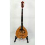 OZARK FLAT BACK BOUZOUKI, in spruce with foliate scroll inlaid pick guard and stained maple back,