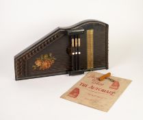 MID 20th CENTURY WEST GERMAN AUTOHARP with ebonised wood case having rose printed decoration,