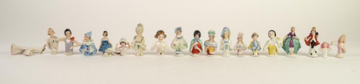 TWENTY SIX SMALL SIZE EARLY TWENTIETH CENTURY AND LATER CHINA PIN CUSHION HALF FIGURES, the earliest