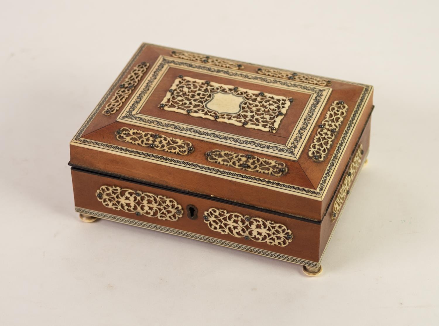INDIAN SANDALWOOD PLAYING CARD OR TABLE CIGARETTE BOX with engraved wavy borders and applied pierced