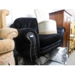 A BLACK VELVET TWO SEATER SETTEE (NEARLY NEW)