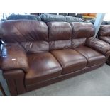 A SOFOLOGY BROWN LEATHER LOUNGE SUITE OF THREE PIECES, VIZ A THREE SEATER SETTEE AND A PAIR OF