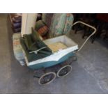 CHILD'S TRIANG TINPLATE VINTAGE DOLLS PRAM, WITH SPOKES WHEELS AND FOOT BRAKE, FABRIC FOLD DOWN HOOD