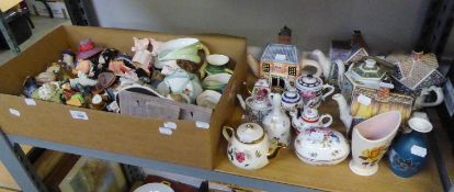 A LARGE SELECTION OF SMALL DECORATIVE ORNAMENTS TO INCLUDE; CHARACTER JUGS, TEAPOTS, VASES, SHOES,