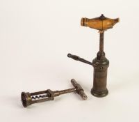 19th CENTURY BRASS AND STEEL PATENT MECHANICAL CORKSCREW with broken and incomplete horn handle