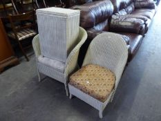 A WHITE LLOYD LOOM BEDROOM CHAIR, ANOTHER SIMILAR ARMCHAIR AND A LINEN RECEIVER  (3)