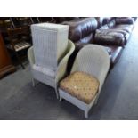 A WHITE LLOYD LOOM BEDROOM CHAIR, ANOTHER SIMILAR ARMCHAIR AND A LINEN RECEIVER  (3)