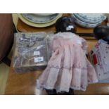 MID TWENTIETH CENTURY MOULDED COMPOSITION BLACK BABY DOLL, WITH SLEEPING EYES, ON A FIVE PIECE