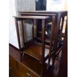 A NEST OF THREE MAHOGANY OBLONG COFFEE TABLES, ON SLENDER, CURVED, SQUARE TAPERING LEGS