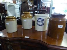 'McDOUGALL?S? ADVERTISING WHITE POTTERY FLOUR STORAGE JAR AND THREE BROWN WARE KITCHEN STORAGE