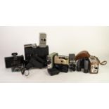 KODAK BROWNIE 8mm MOVIE CAMERA II with wind up mechanism TOGETHER WITH FOUR OTHER VINTAGE MOVIE