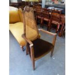 1920?S WALNUT BERGÈRE OPEN ARMCHAIR, WITH TEAR SHAPED CANE PANELLED BACK, STUFFED-OVER SEAT IN BROWN