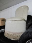 A BOUDOIR ARMLESS EASY CHAIR, IN GREY VELVET