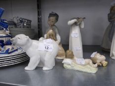 4 LLADRO SPANISH PORCELAIN ORNAMENTS, VIZ A YOUNG BOY SEATED WITH A DOG; A GIRL IN A NIGHTDRESS (