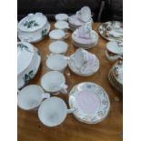 'ROYAL SUTHERLAND' CHINA TEA SERVICE IN PINK AND GILT DECORATION, 33 PIECES, TO INCLUDE; 11 TEACUPS,