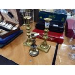 PAIR OF VICTORIAN BRASS CANDLESTICKS WITH KNOP STEMS, THE SQUARE BASE WITH EJECTORS, 8" (20.3cm) and