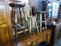 AN OAK CIRCULAR TOP HIGH STOOL, A SIMILAR SMALLER STOOL AND ANOTHER STOOL (3)