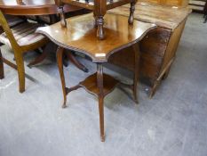 AN EDWARDIAN SHAPED SQUARE TOPPED OCCASIONAL TABLE ON SLENDER CABRIOLE LEGS