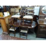 A REPRODUCTION MAHOGANY TWIN PEDESTAL DINING TABLE, WITH EXTRA LEAF AND SIX DINING CHAIRS (4+2) (7)