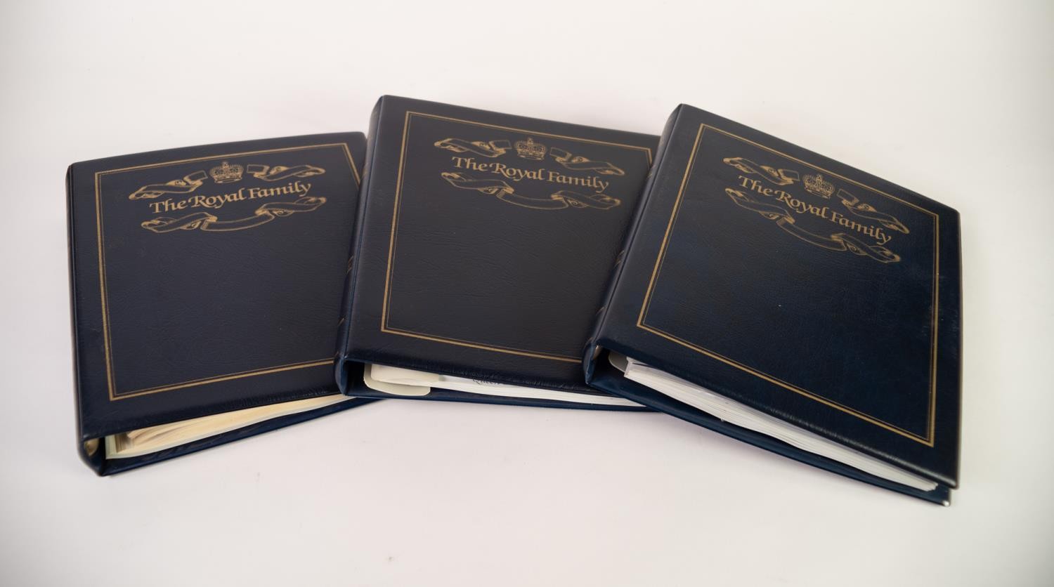 THREE BLUE BINDERS COMMEMORATING THE ROYAL FAMILY
