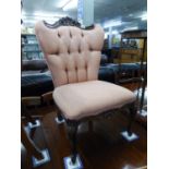 A REPRODUCTION PINK FABRIC COVERED NURSING CHAIR