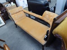 AN EDWARDIAN DARK STAINED BEECHWOOD FRAMED CHAISE LONGUE