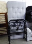 A MATCHED PAIR OF REFURBISHED BLACK ENAMELLED IRON SINGLE BEDSTEADS WITH MATTRESSES