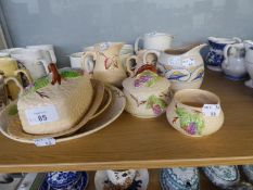 SEVEN WADE 'BRAMBLE' EMBOSSED AND PAINTED POTTERY ITEMS COMPRISING; A BUTTER DISH AND DOMED COVER;