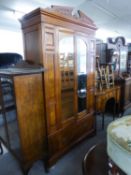 A LATE VICTORIA/EDWARDIAN WALNUTWOOD TWO DOOR WARDROBE WITH BASAL DRAWER