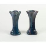 PAIR OF PILKINGTONS BLUE VEINED OPALESCENT GLAZED POTTERY VASES, each of square, twisted form with