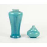 TWO PILKINGTONS PALE BLUE AND PURPLE VEINED OPALESCENT POTTERY VASE, one of slender ovoid form, 9 ½?