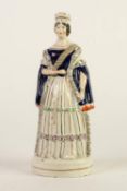 NINETEENTH CENTURY STAFFORDSHIRE POTTERY FIGURE OF QUEEN VICTORIA, painted in colours and modelled