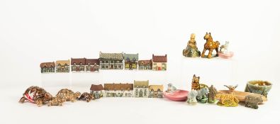 TWELVE WADE MINIATURE COTTAGES; four Wade graudated TORTOISE MODELS; three Wade PIN TRAYS and a nine