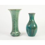 TWO PILKINGTONS PALE GREEN CURDLED OPALESCENT GLAZED POTTERY VASES, one of slender baluster form,