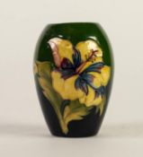 WALTER MOORCROFT HIBISCUS PATTERN TUBE LINED POTTERY VASE, of ovoid form, decorated in tones of