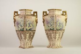 PAIR OF 'NIPPON', JAPAN, LATE 19th CENTURY LOZENGE SHAPE TWO HANDLE POTTERY VASES, with tube lined