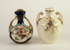 EARLY TWENTIETH CENTURY AMPHORA TWO HANDLED PORCELAIN VASE, with floral painted panels on a gilt