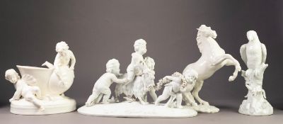 NINETEENTH CENTURY MINTONS WHITE GLAZED RECEIVER GROUP, modelled with snail shell and two putti,