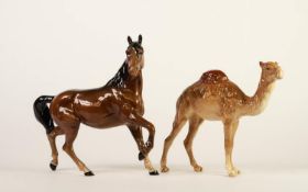 BESWICK POTTERY MODEL OF A CAMEL, 7? (17.8cm) high, together with a ROYAL DOULTON MODEL OF A