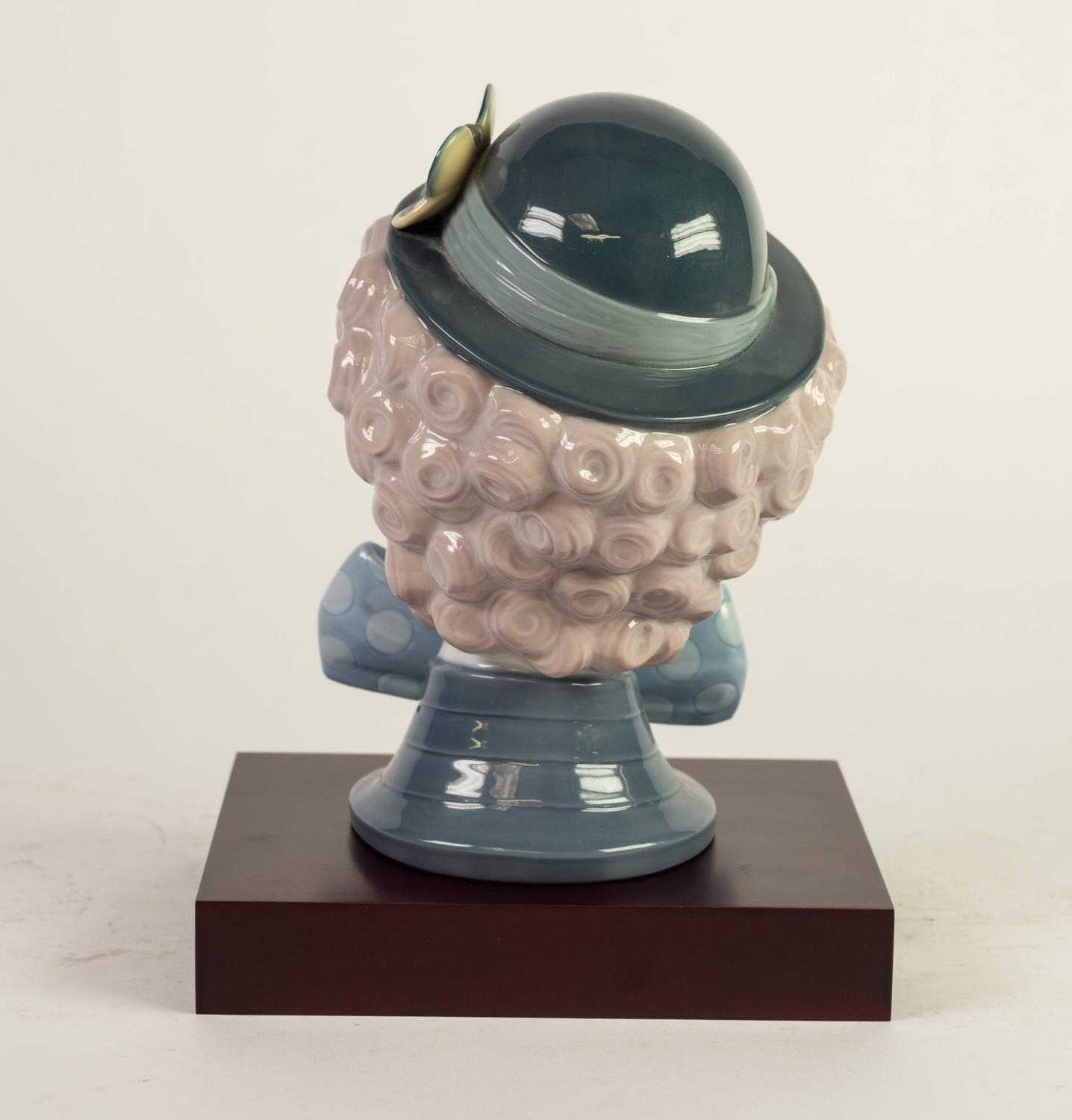 MODERN LLADRO PORCELAIN CLOWN?S HEAD, 5611, 8 ¼? (21cm) high, on wood effect oblong base, printed - Image 2 of 3