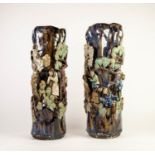 PAIR OF CHINESE LATE QING DYNASTY PROVINCIAL WARE STONEWARE CYLINDRICAL VASES, each sculpted in bold