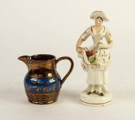 NINETEENTH CENTURY STAFFORDSHIRE POTTERY FIGURE, heightened in gilt and modelled as a flower seller,