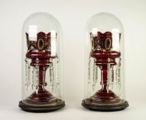 FINE PAIR OF LATE 19th CENTURY GLASS LUSTRES, UNDER ORIGINAL GLASS DOMES, the goblet form lustres