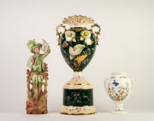 CONTINENTAL TWO HANDLED POTTERY PEDESTAL VASE, of ovoid form with wavy rim and rococo scroll moulded