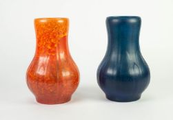 PAIR OF ROYAL LANCASTRIAN MOULDED POTTERY VASES IN DIFFERENT GLAZES, of baluster form with stiff