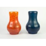 PAIR OF ROYAL LANCASTRIAN MOULDED POTTERY VASES IN DIFFERENT GLAZES, of baluster form with stiff