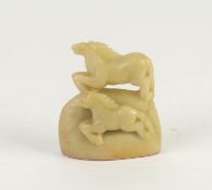 CHINESE PALE CELADON JADE CARVING OF TWO HORSES, 3in (7.5cm) high