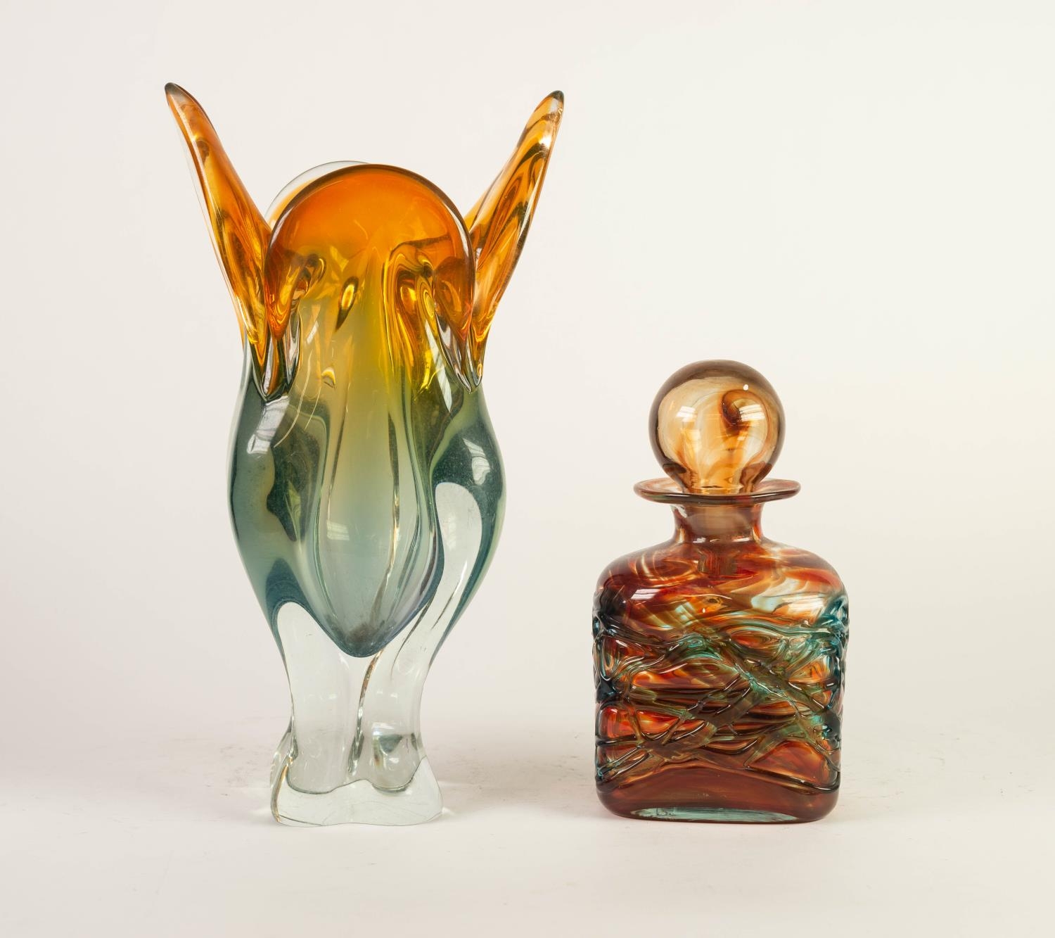 MDINA, MALTA, STUDIO GLASS OBLONG SECTION DECANTER AND GLOBULAR STOPPER, amber stained and trailed