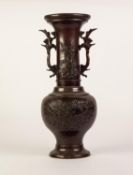 JAPANESE MEIJI PERIOD CHOCOLATE BROWN PATINATED BRONZE VASE, cast in low relief with opposing